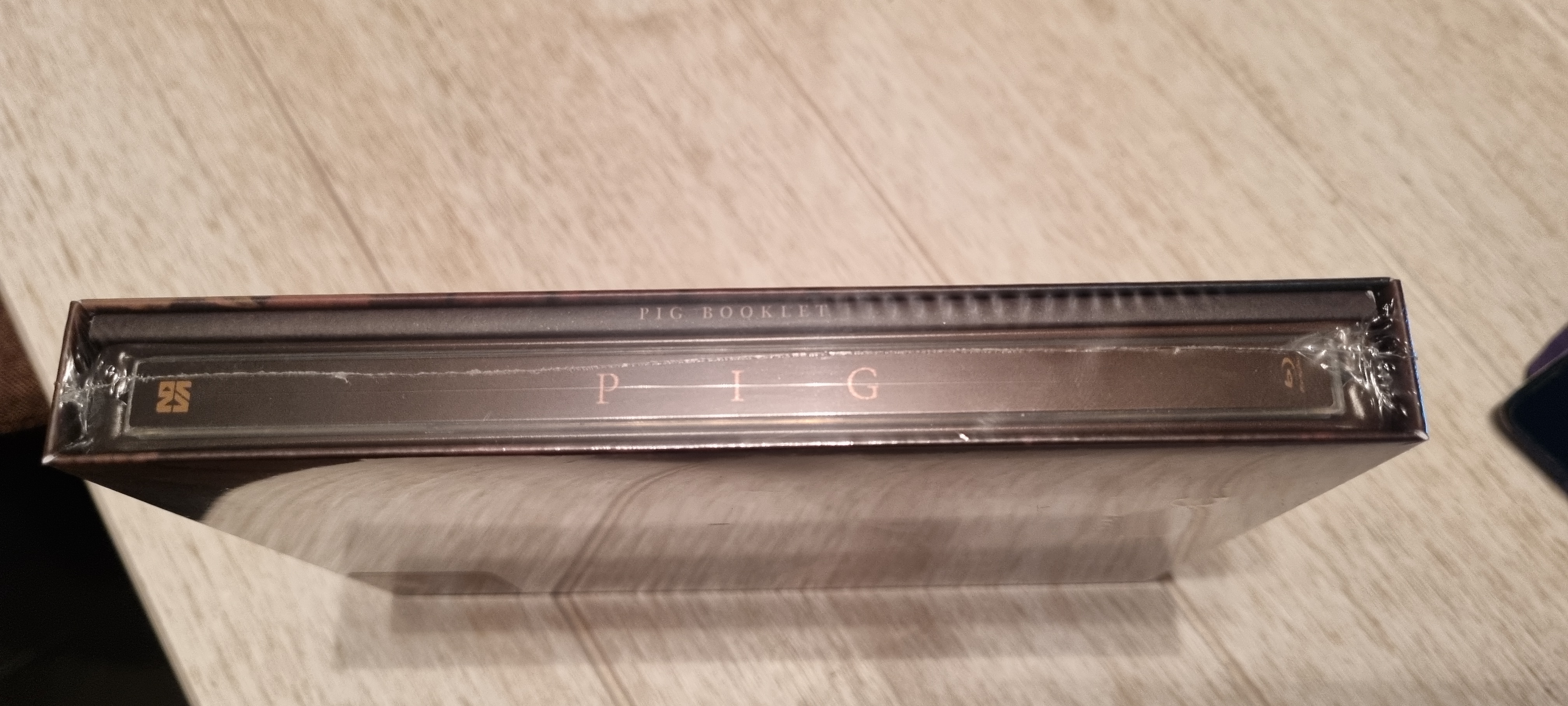 Pig Novamedia spine scratched.jpg