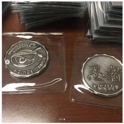 HDN Challenge coin polished metal variant.png