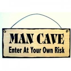 lens17497211_1295230934Man_Cave_Sign_Enter_at_Yo.jpg