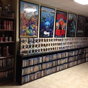 Blu-ray and Funko Pop wall
