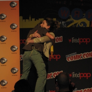 Jewel hugging a fan on stage dressed as Kaylie at the Firefly Panel. Aww moment of the night.