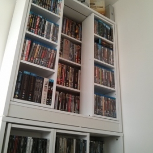 BluRays at the front and DVDs behind.

There's 2 media units here, one on top of the other, purchased from ISME.com at £70 each.