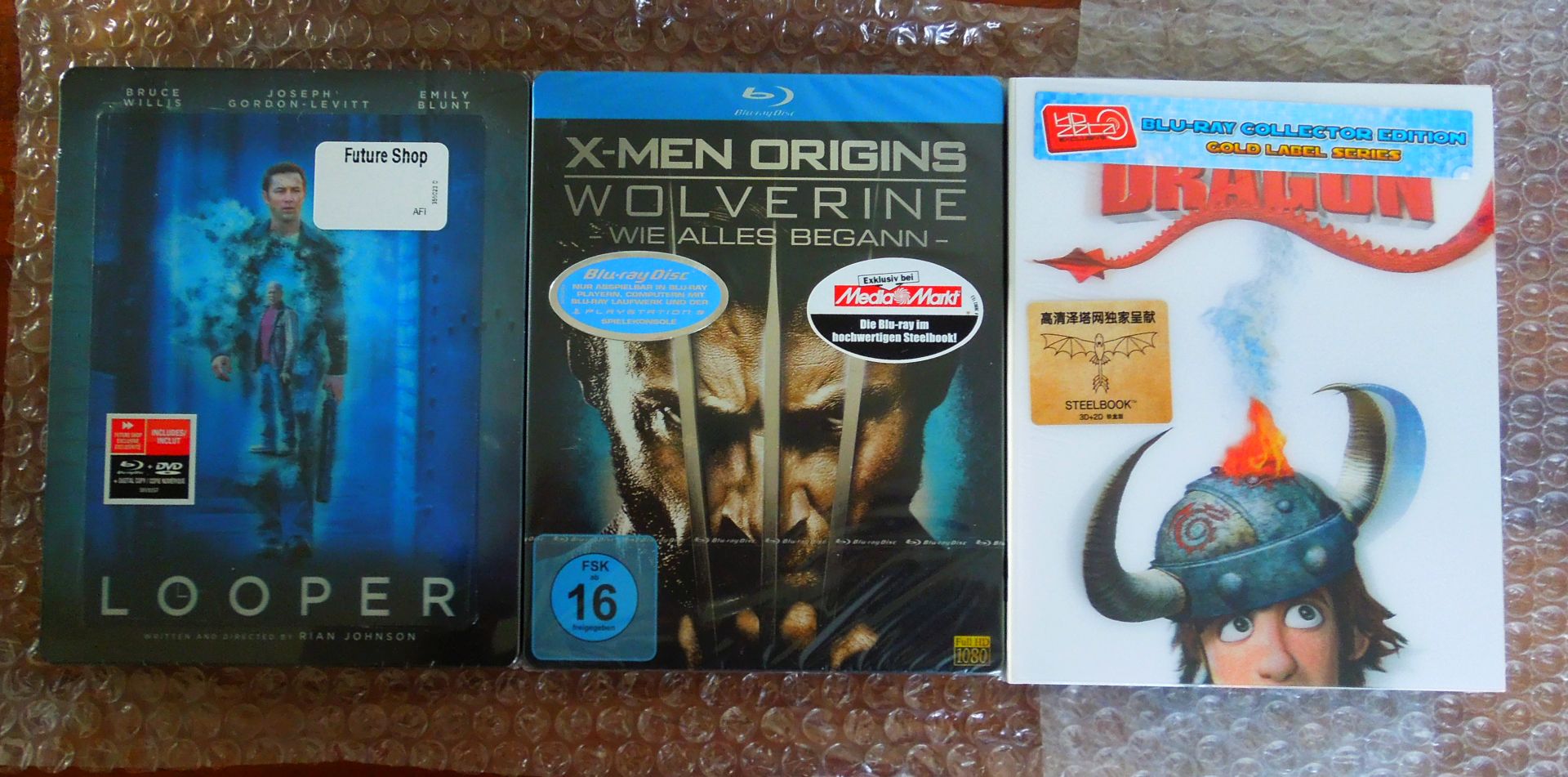 Looper CA FS + X-Men Orgins - Woverine + HttyD CN F
