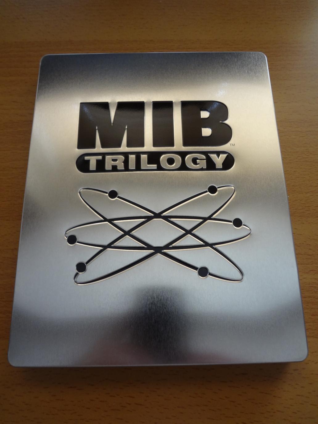 Men In Black Trilogy  Play.com Exclusive Embossed Steelbook Front