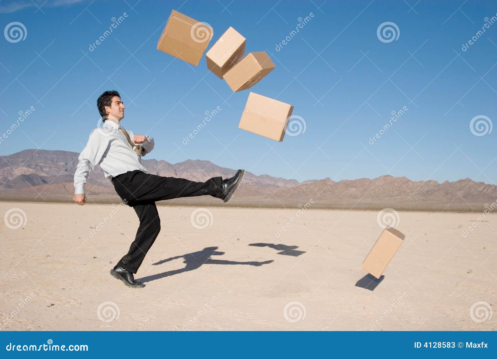 businessman-kicking-boxes-4128583.jpg