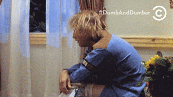dumb and dumber sudden realization GIF